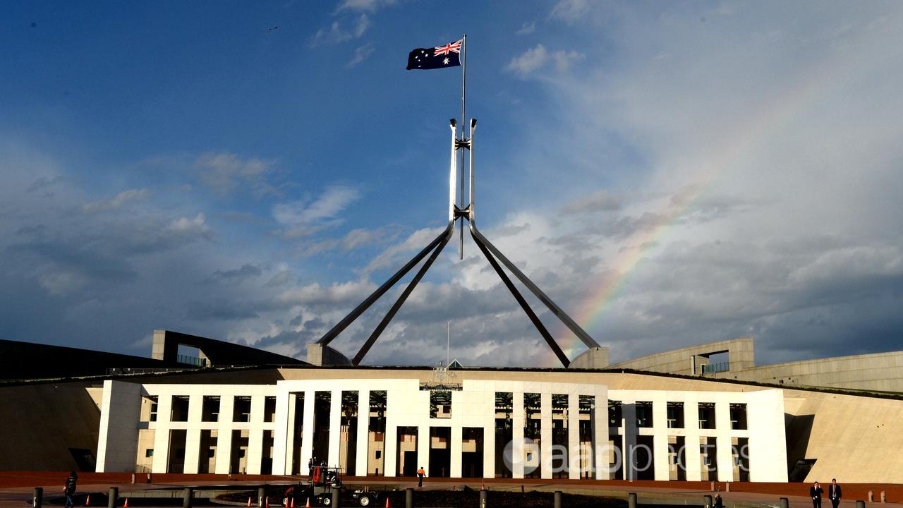 A partial rainbow outside Australian Parliament House, in Canberra