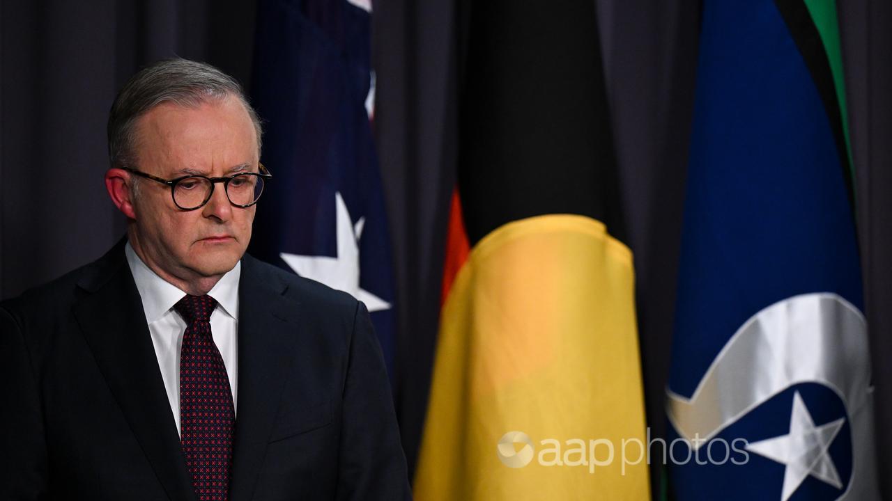 Albanese delivering a statement at Parliament House.