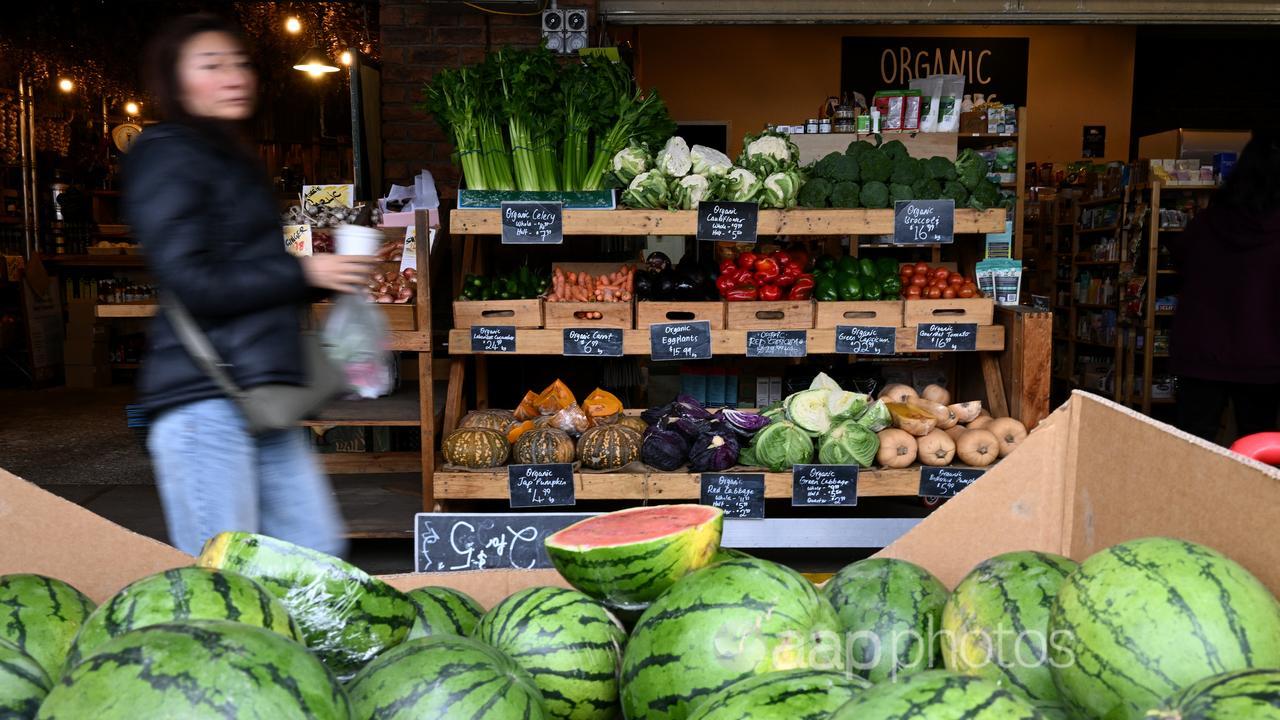 Members of the public shopping for fresh produce