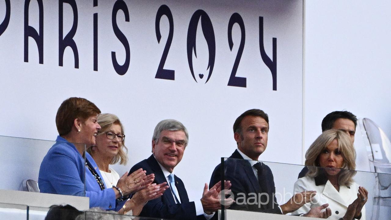 Brigitte Macron and her husband at the Olympics closing ceremony.