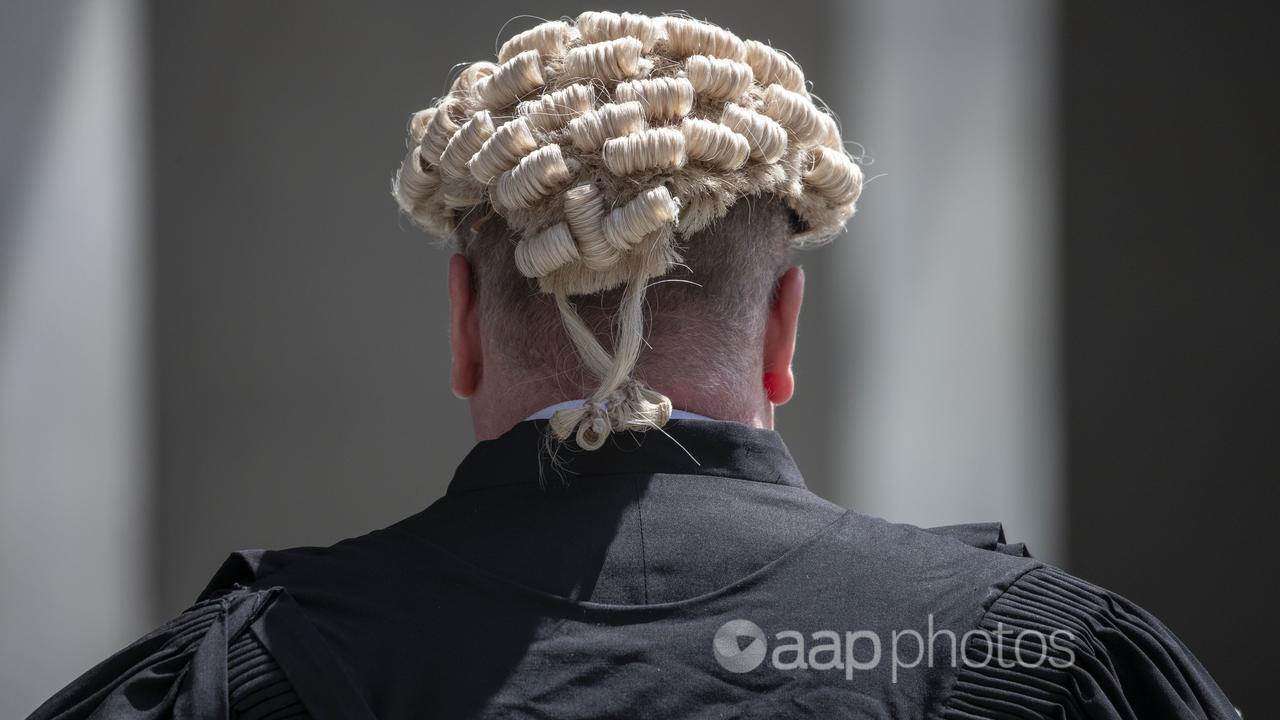 A barrister wears a wig at the Supreme Court