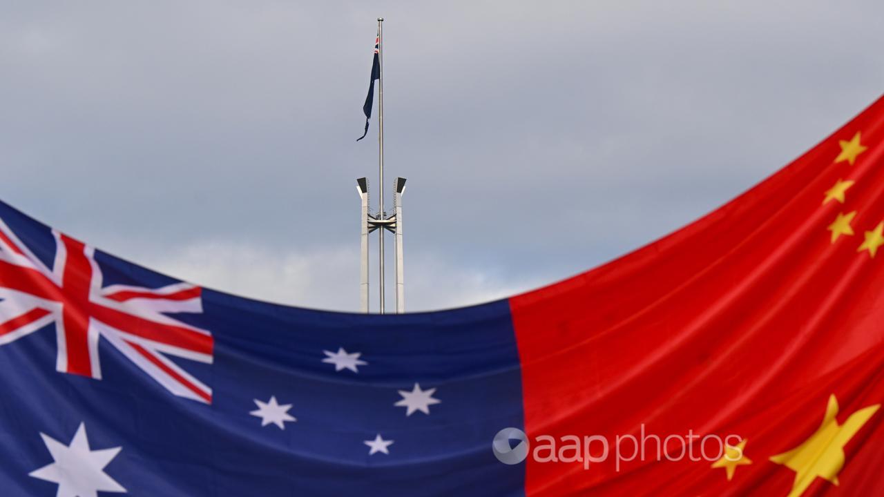 A flag displaying portions of the Australian and Chinese ensigns.