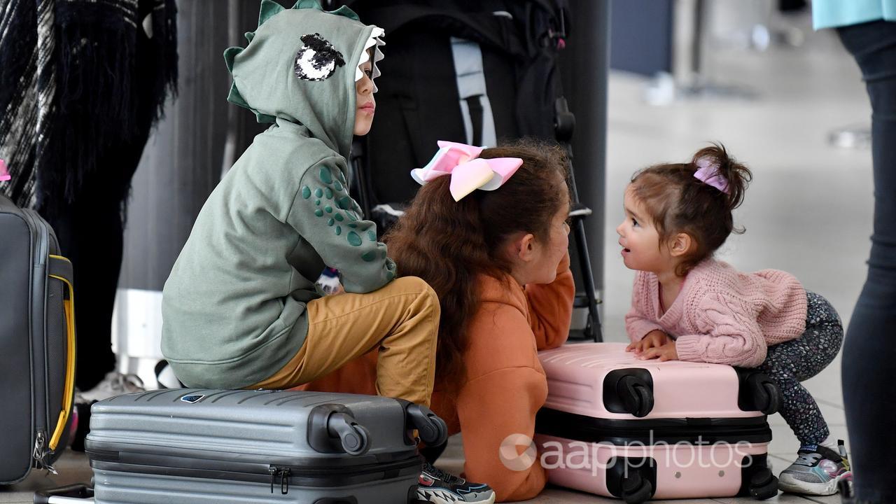 Children waiting for a flight.