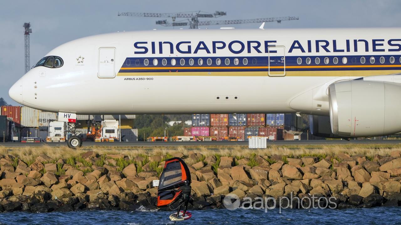 A Singapore Airlines plane landing in Sydney