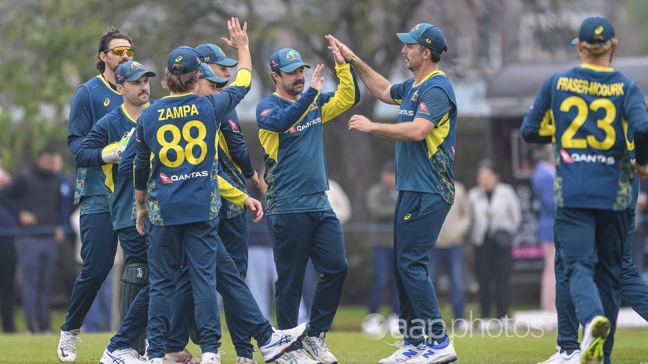 Australia's players celebrate.