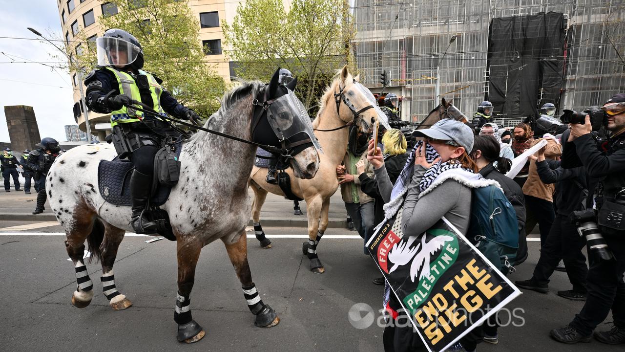 Protesters confronted mounted police in Melbourne's CBD.