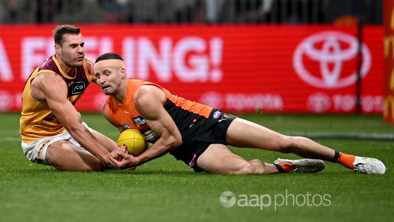 Jesse Hogan marks in front of Jack  Payne.