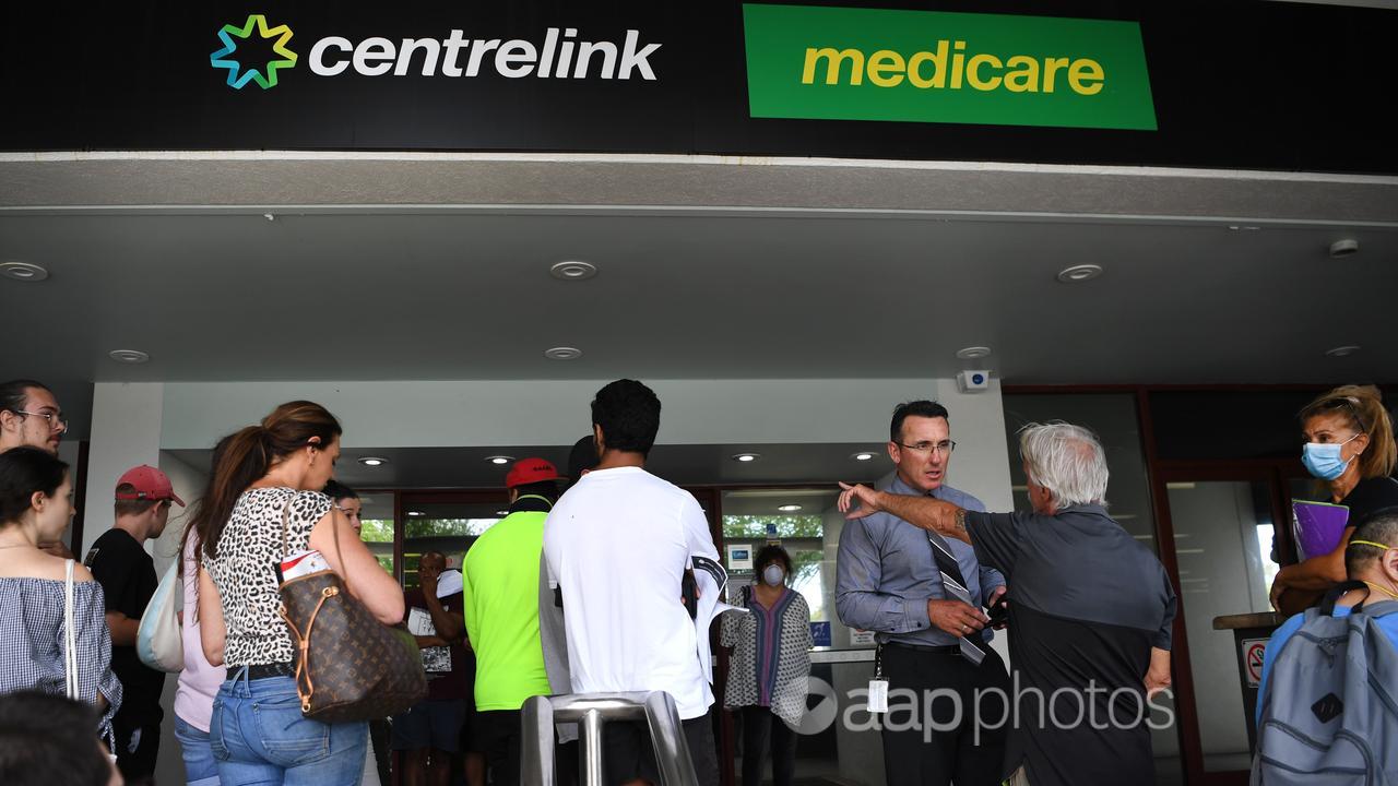 People queueing outside Centrelink in Southport on the Gold Coast