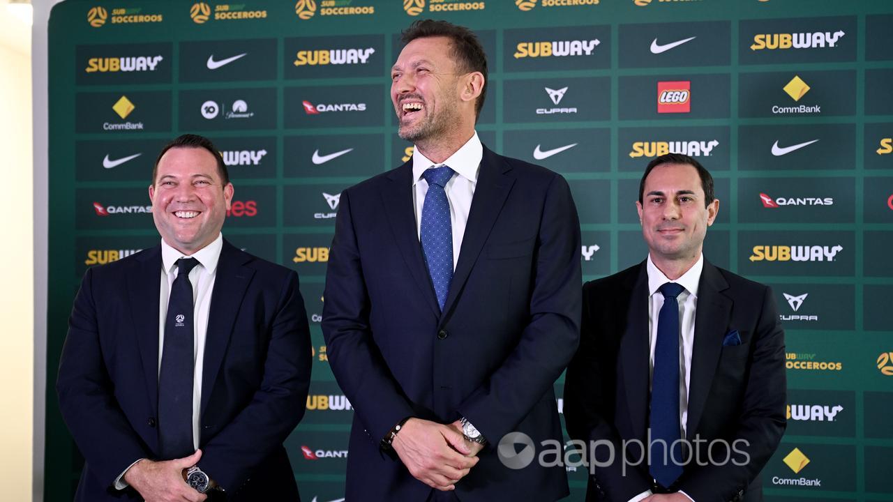 James Johnson (left), Tony Popovic and FA chair Anter Isaac.