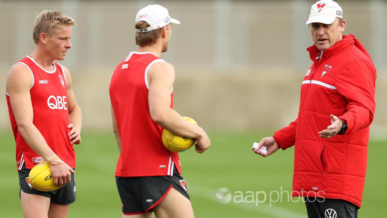 (L-R) Isaac Heeney, Callum Mills and John Longmire.