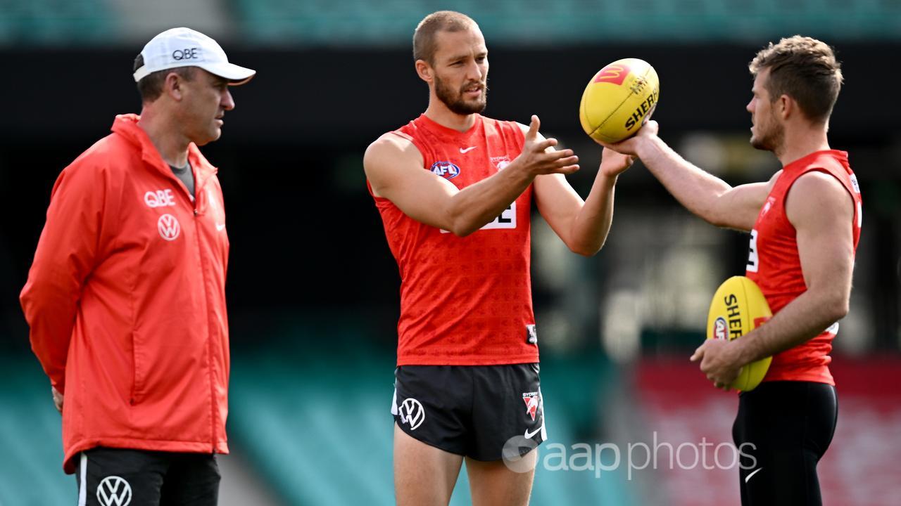 (L-R) John Longmire, Sam Reid and Luke Parker.