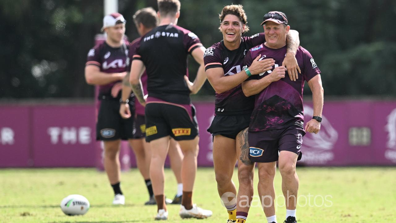 Fullback Reece Walsh and coach Kevin Walters.