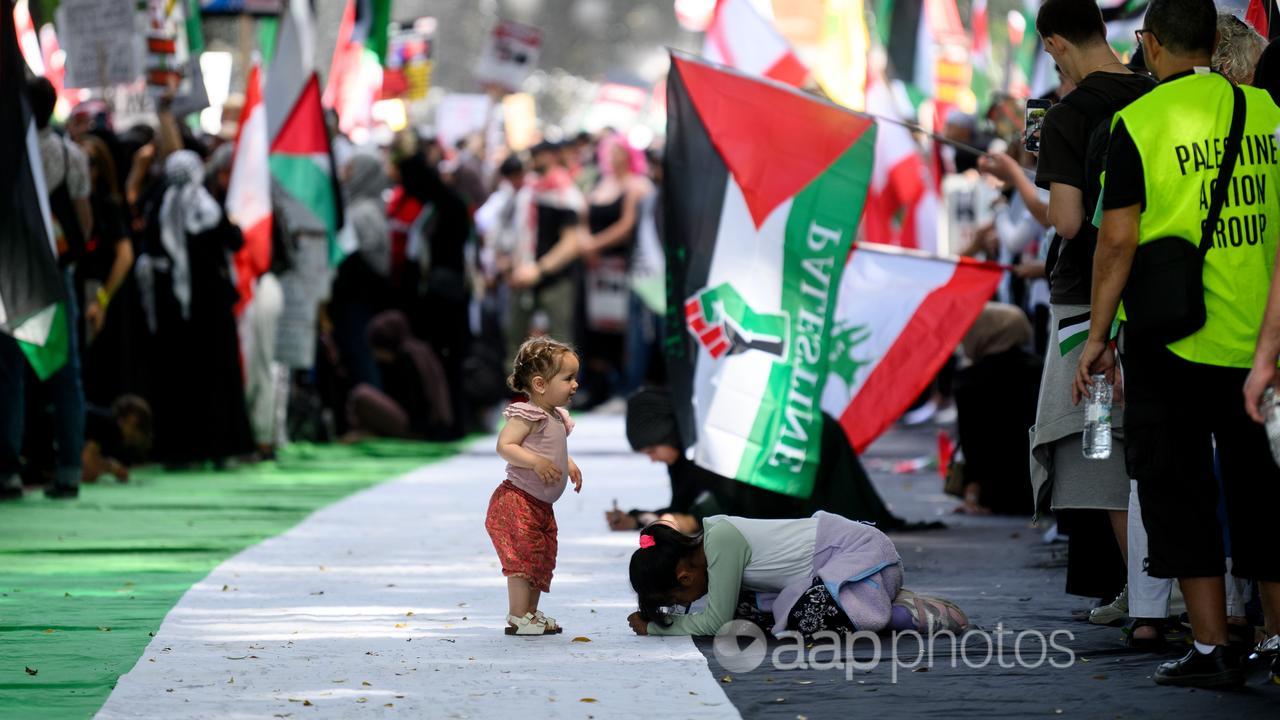 Children dance during a Pro-Palestine rally in Sydney