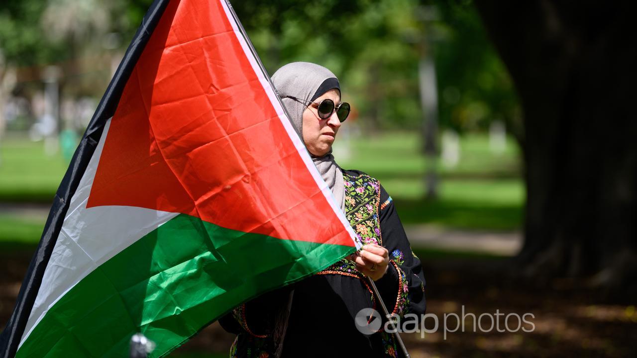 A woman during a Pro-Palestine rally in Sydney on Sunday