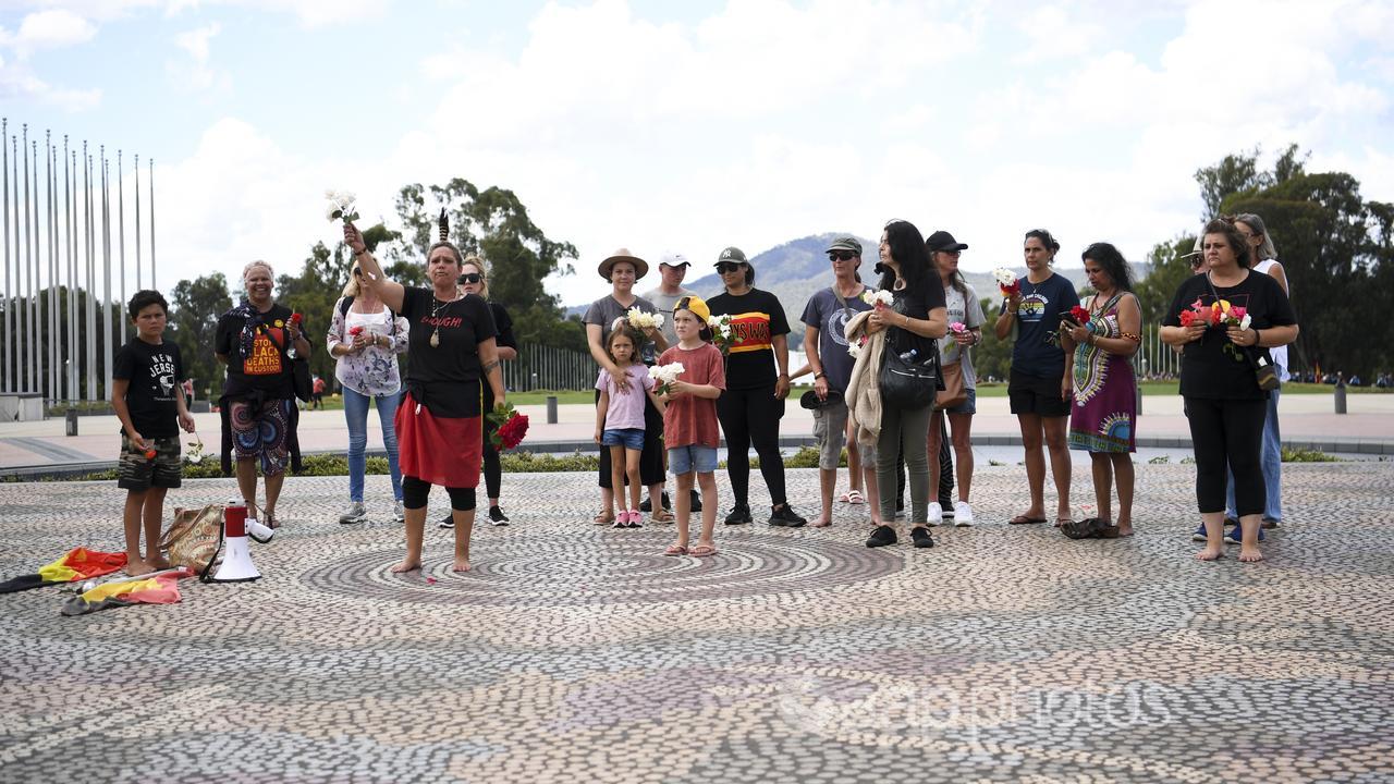 Protestors on the forecourt of Parliament House, Canberra.