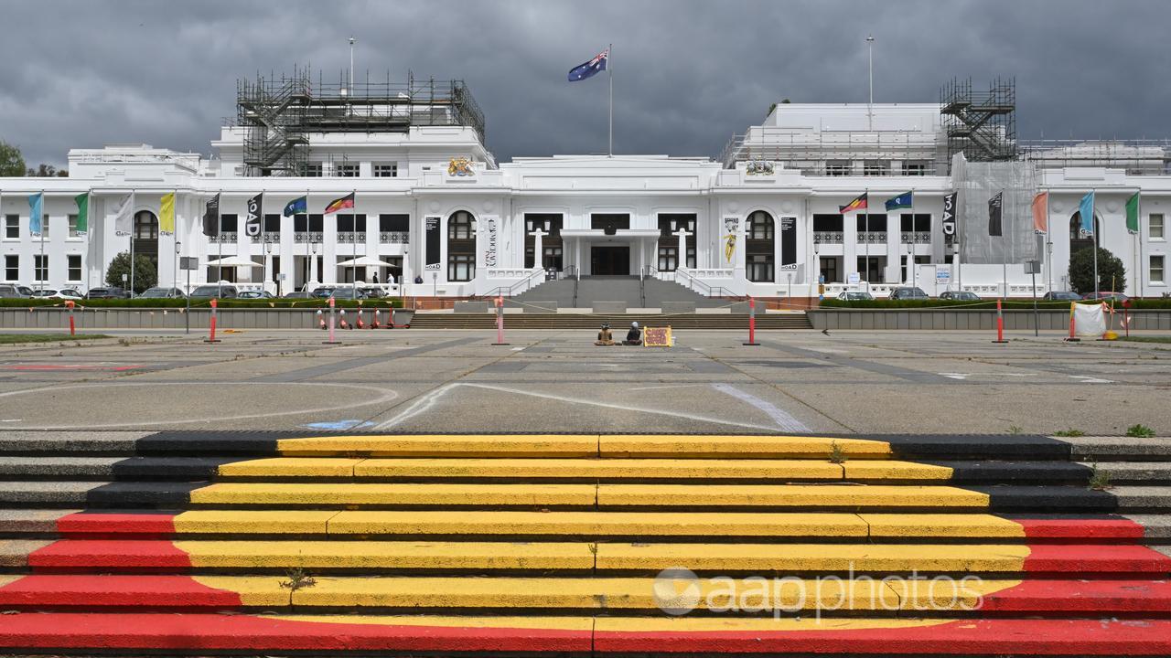 The Aboriginal flag painted on the steps at Old Parliament House