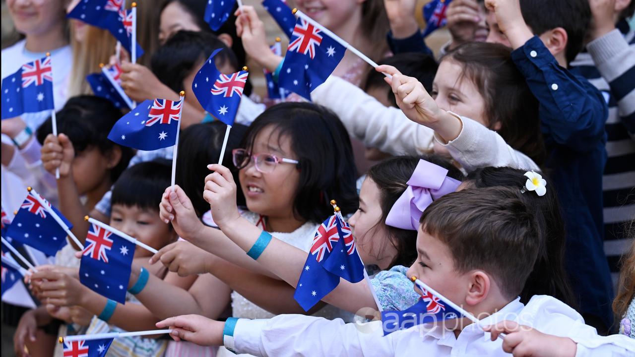 Children outside King and Queen's visit to church