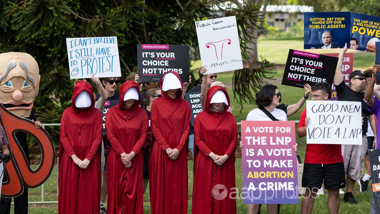 Protesters outside the LNP election campaign launch in Ipswich