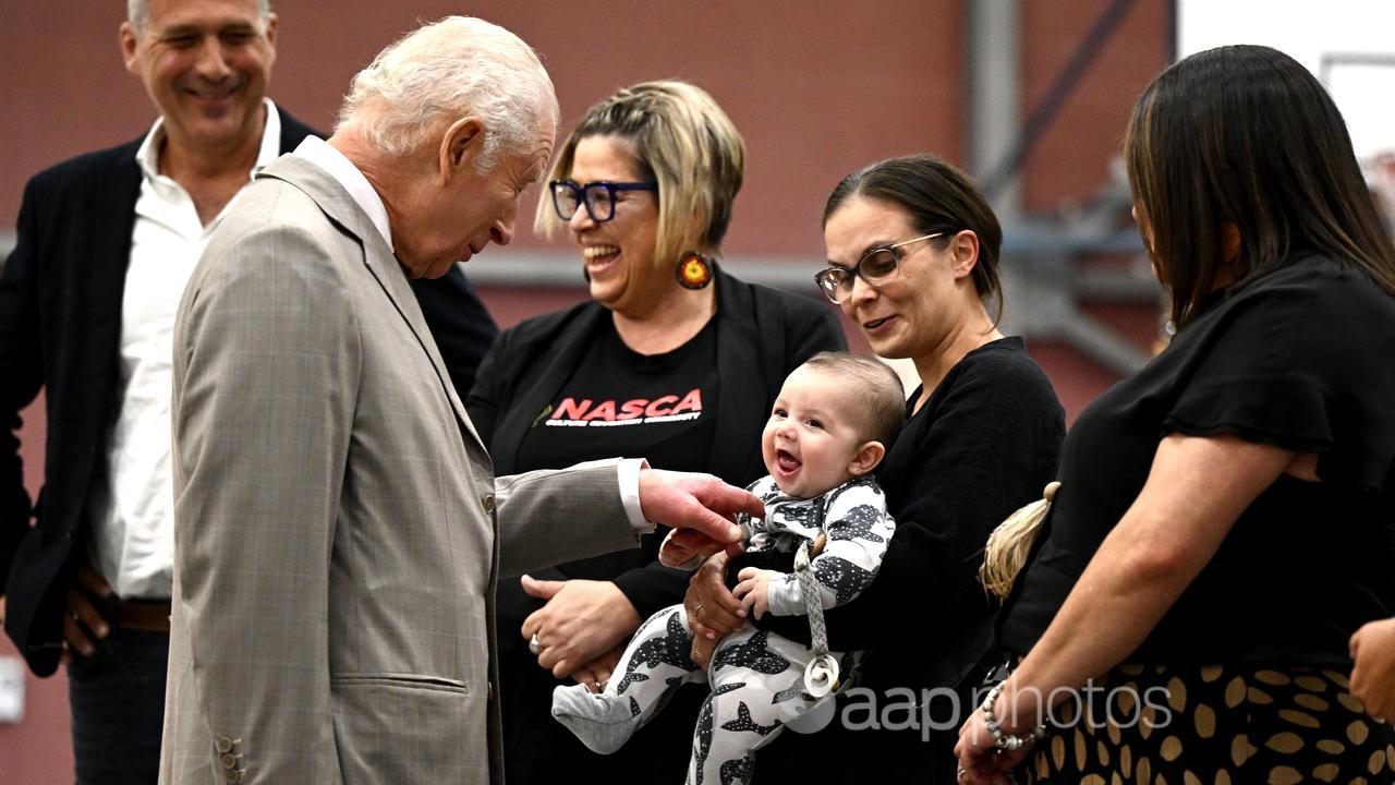 King Charles III meets Chloe Wighton and her baby son Jack Rose