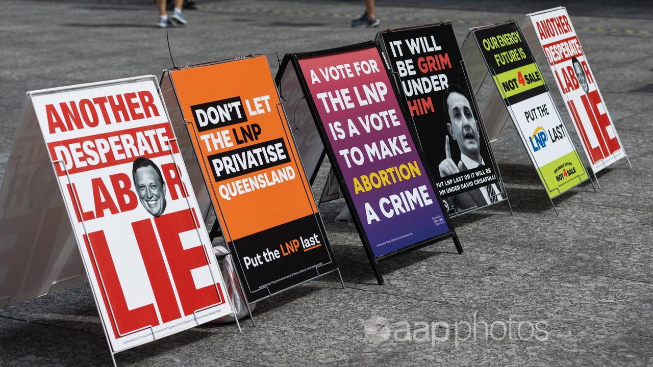 Political placards are seen outside Brisbane City Hall