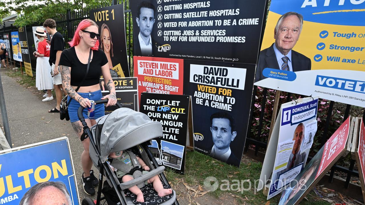 a corridor of election posters in Brisbane..