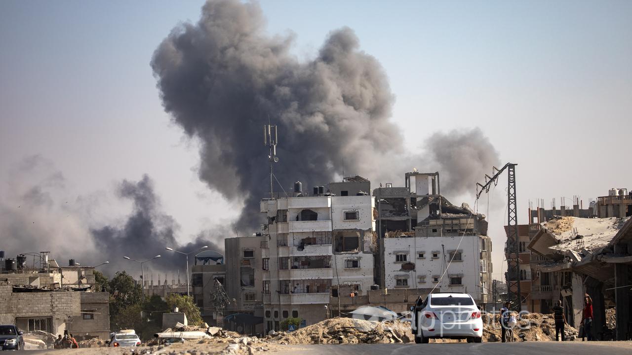 Smoke rises following an Israeli air strike in Khan Younis.