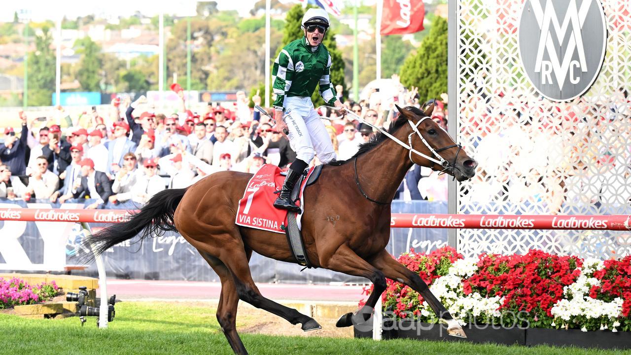 Jockey James McDonald reacts while riding Via Sistina to victory.