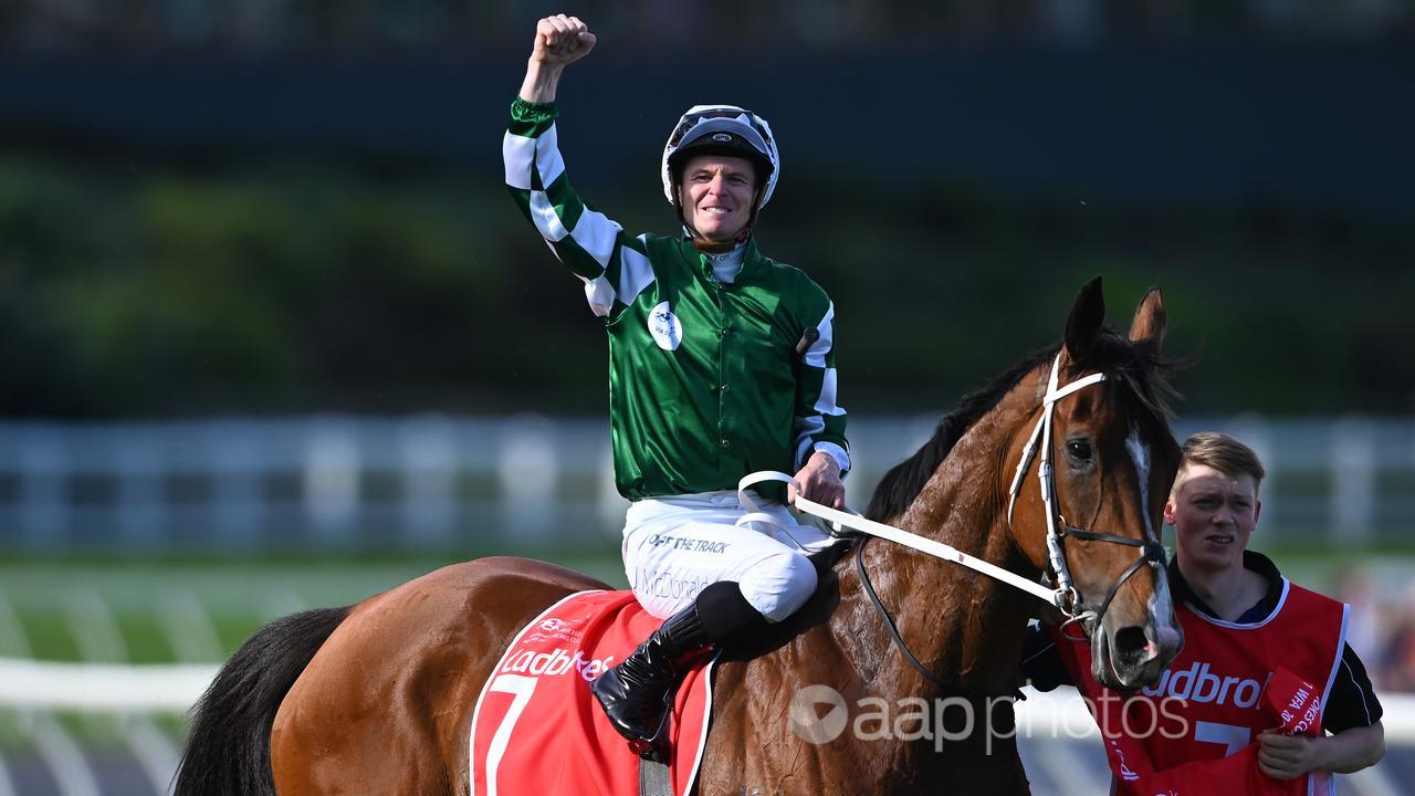 James McDonald salutes the crowd after his Cox Plate win.