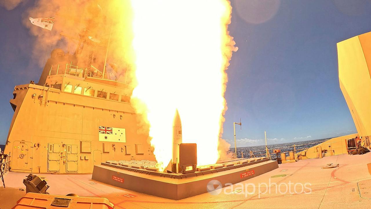 A missile is fired from a Hobart class destroyer.