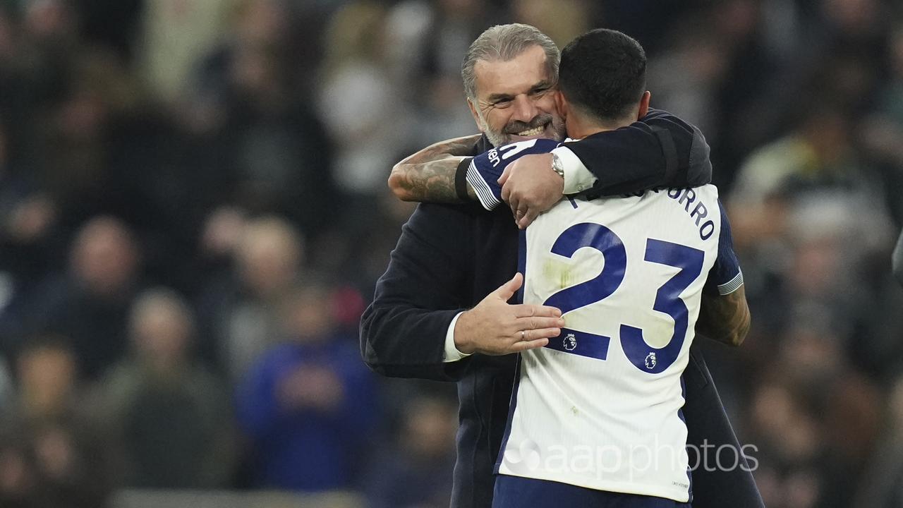 Ange Postecoglou (left).