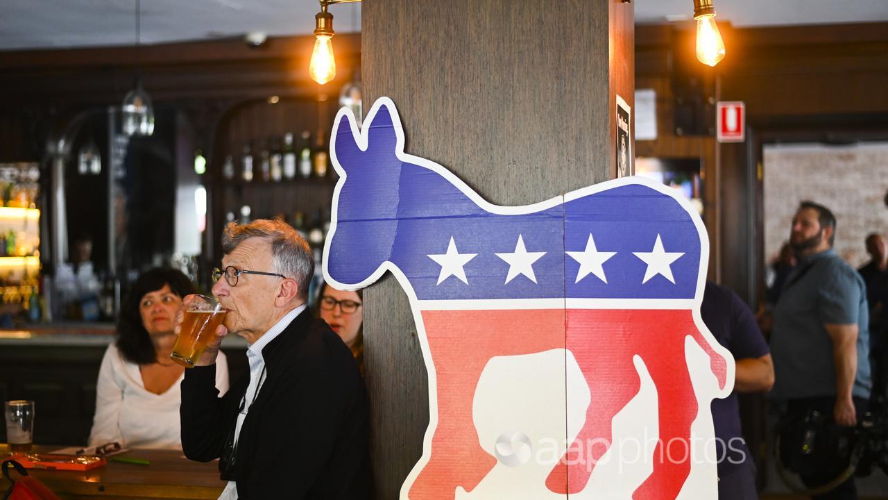 Patrons watch US election coverage at a pub in Canberra