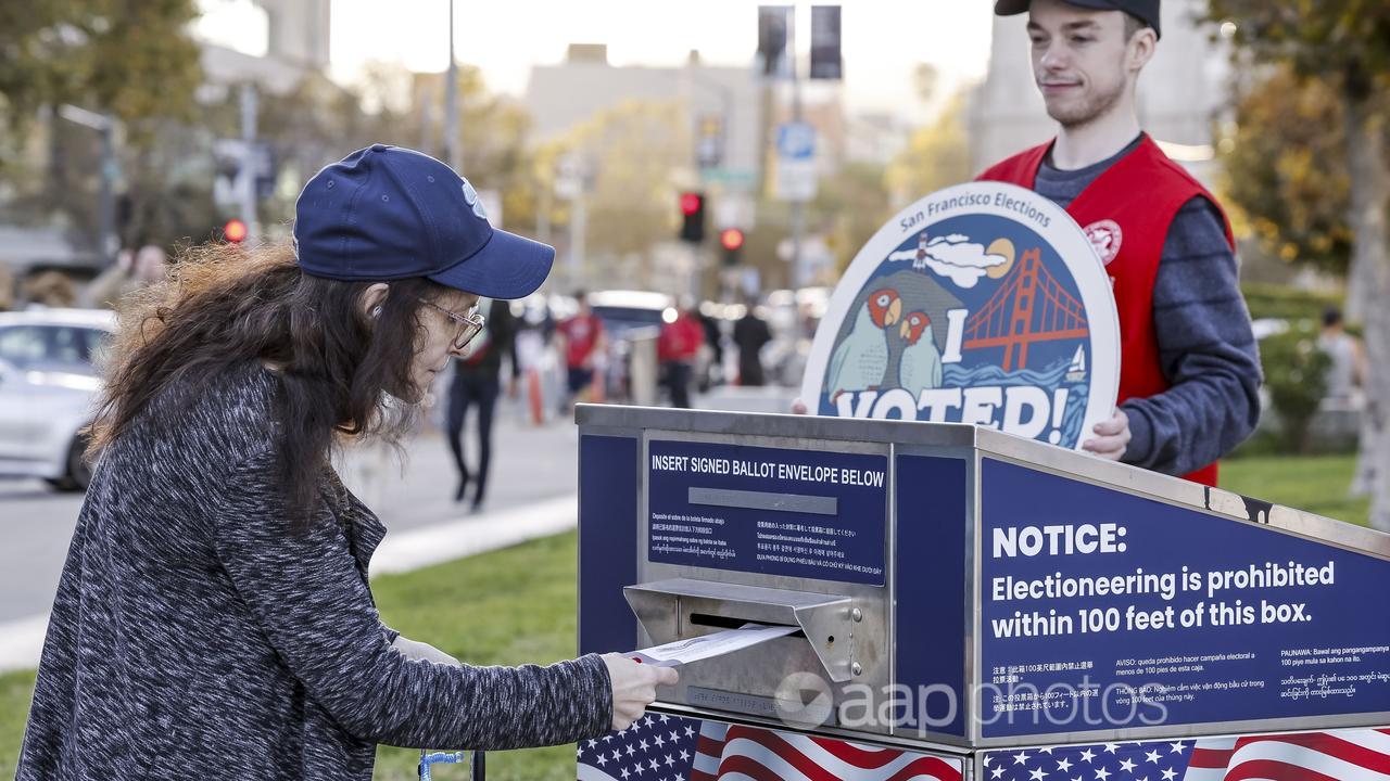 A voter casts their ballot in California.