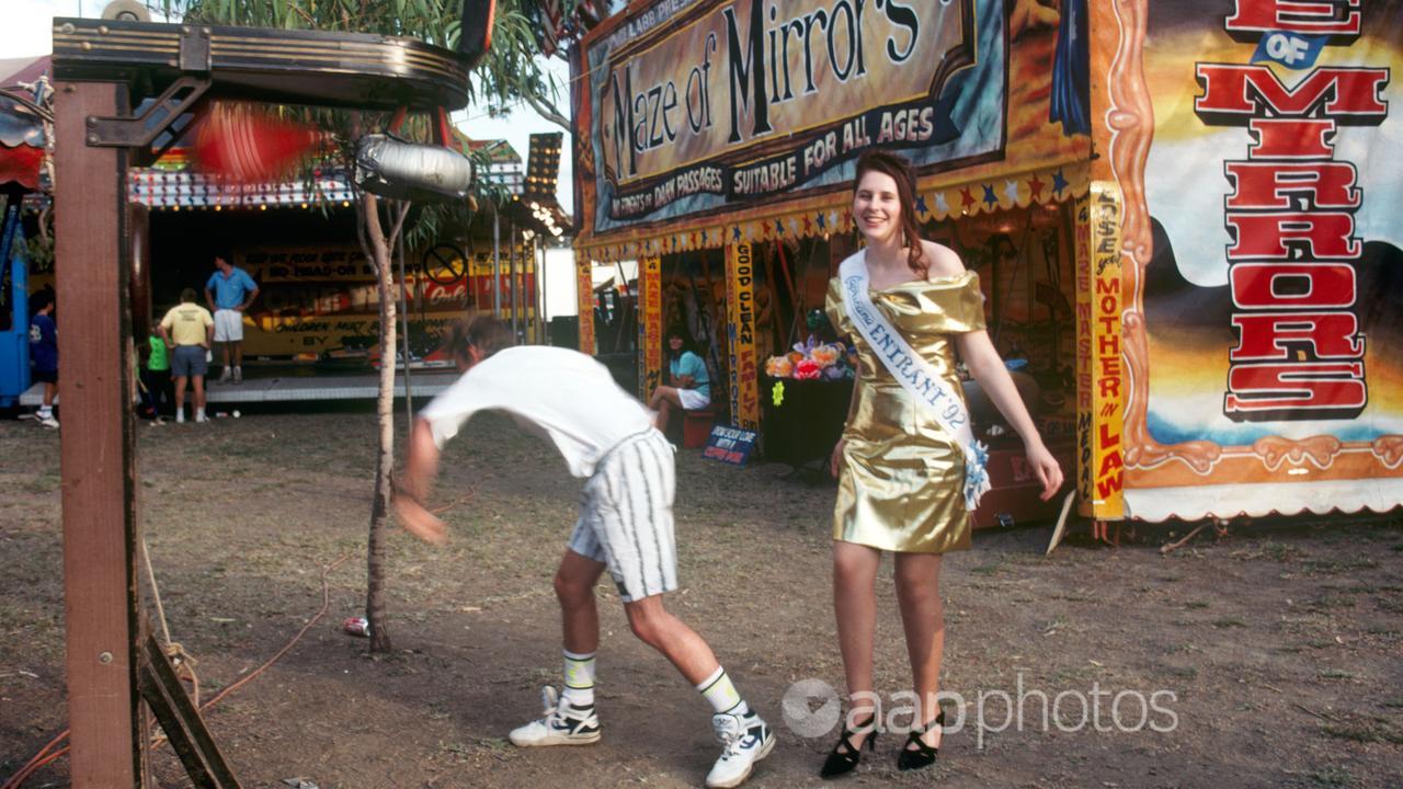 A showgirl entrant poses at a country show near Rockhampton