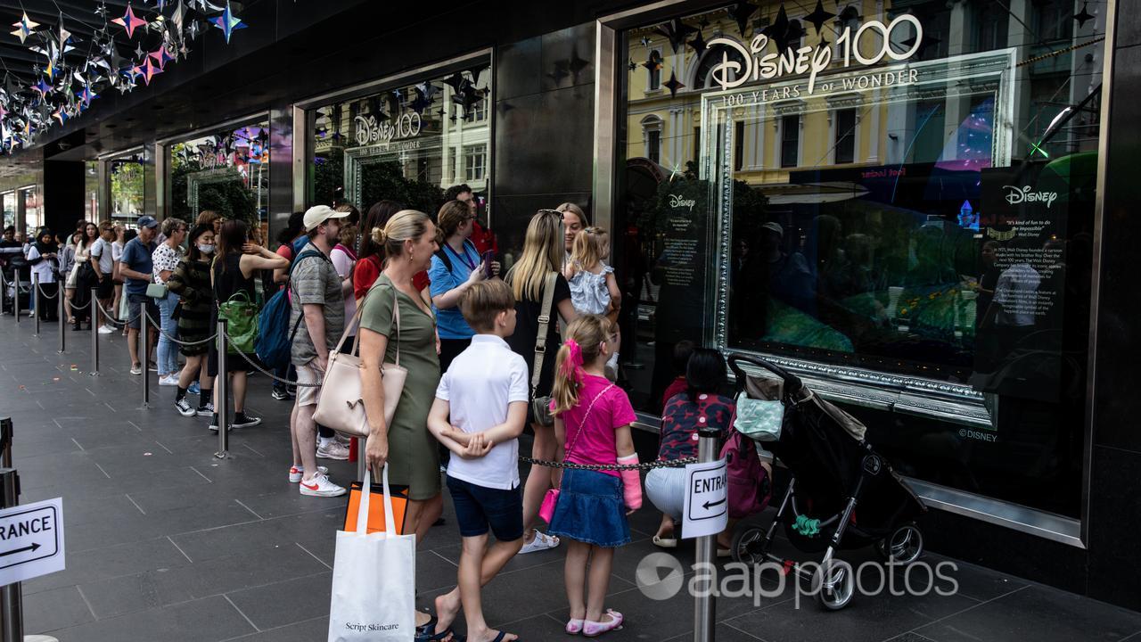 People view the Myer Christmas Windows in 2022.