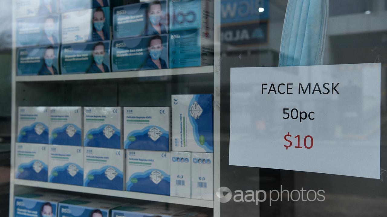 Face masks displayed for sale in a shop window in Merrylands, Sydney