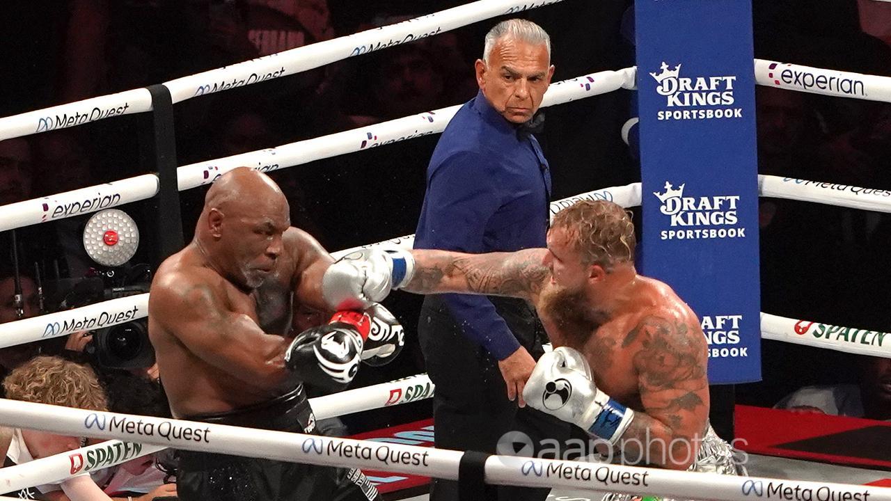 Jake Paul (R) in action against Mike Tyson (L) in Arlington, Texas