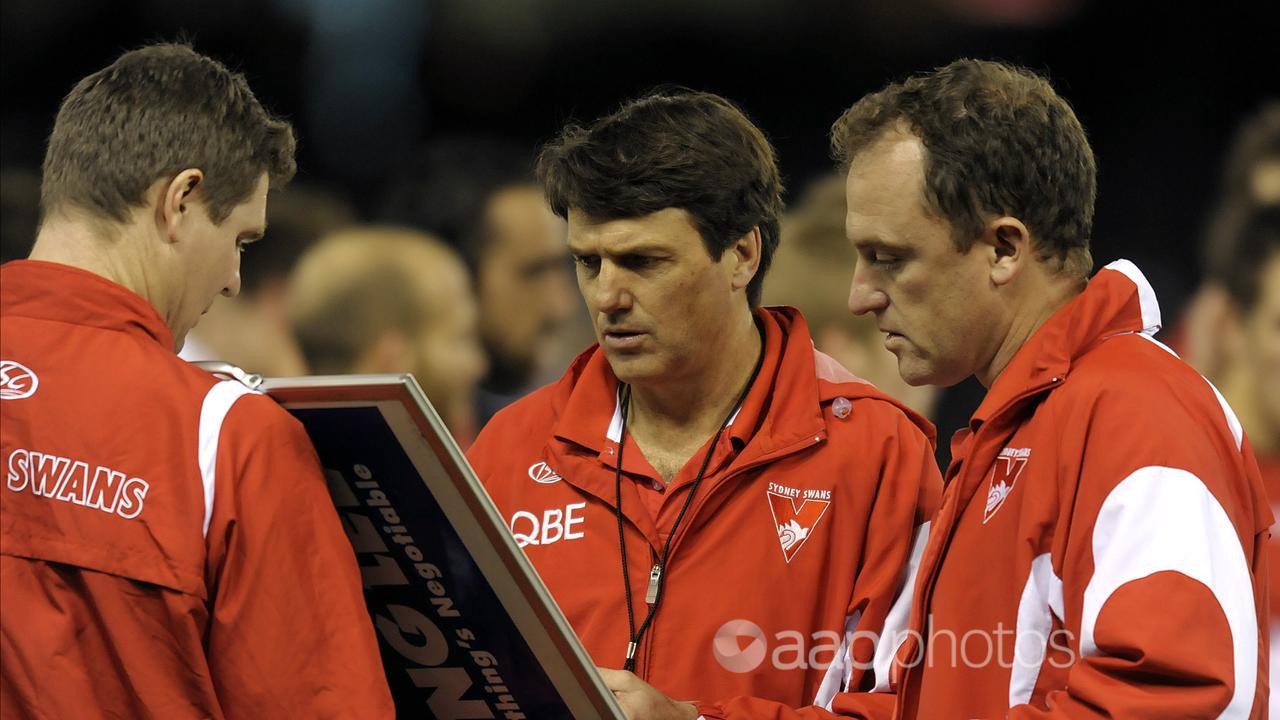 Paul Roos and John Longmire.