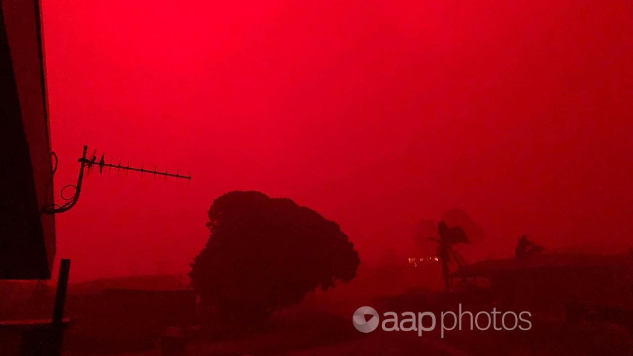 a red sky as bushfires approach Mallacoota in December 2019