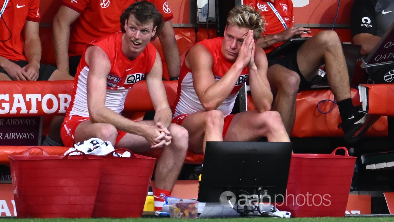 Swans players Nick Blakey (left) and Isaac Heeney