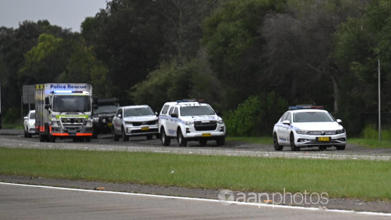 Police investigate a body found wrapped in plastic near Sydney Airport