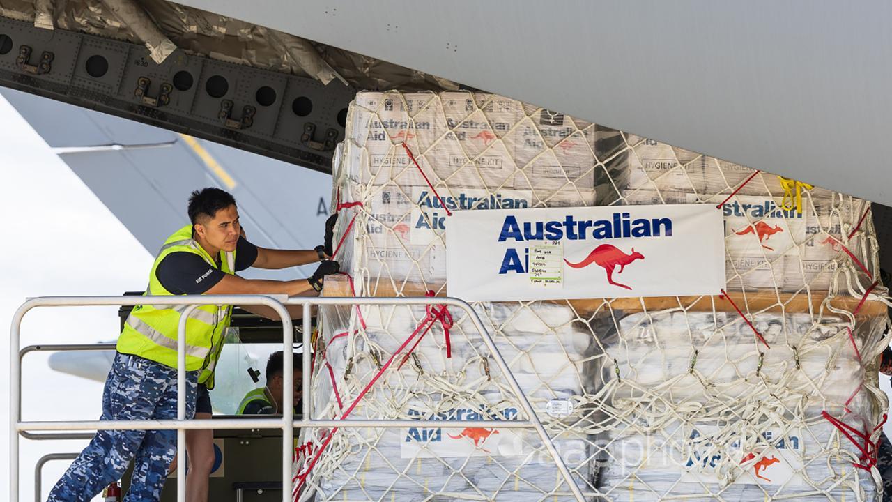 Aid is loaded onto a C-17A Globemaster III bound for Vanuatu