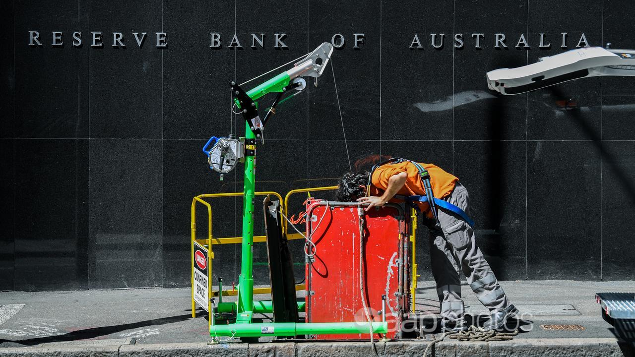 A workman outside the RBA building (file image)