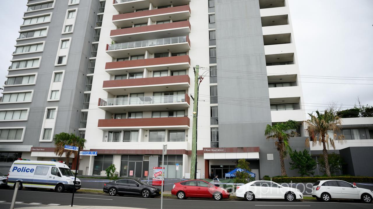 Police outside an apartment building in Parrammatta