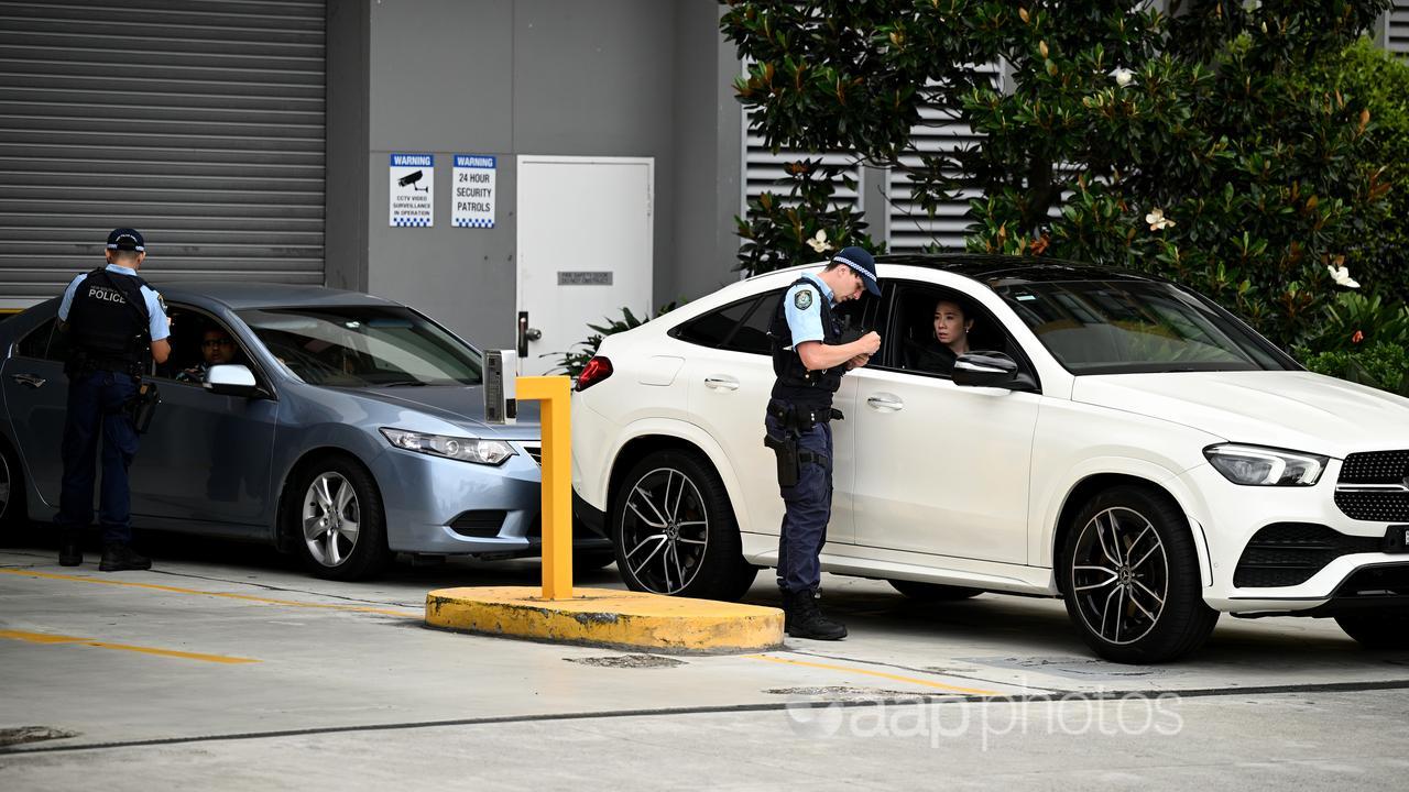 Police outside an apartment building in Parrammatta