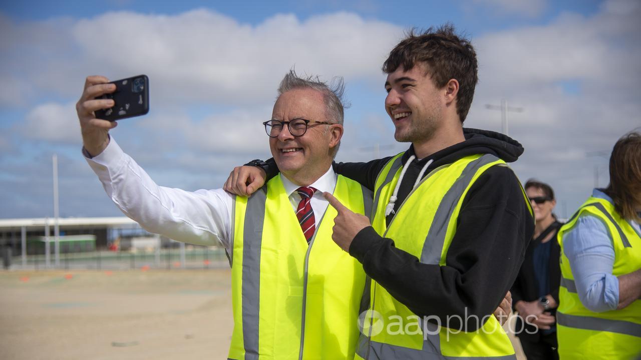 Australian Prime Minister Anthony Albanese takes a selfie