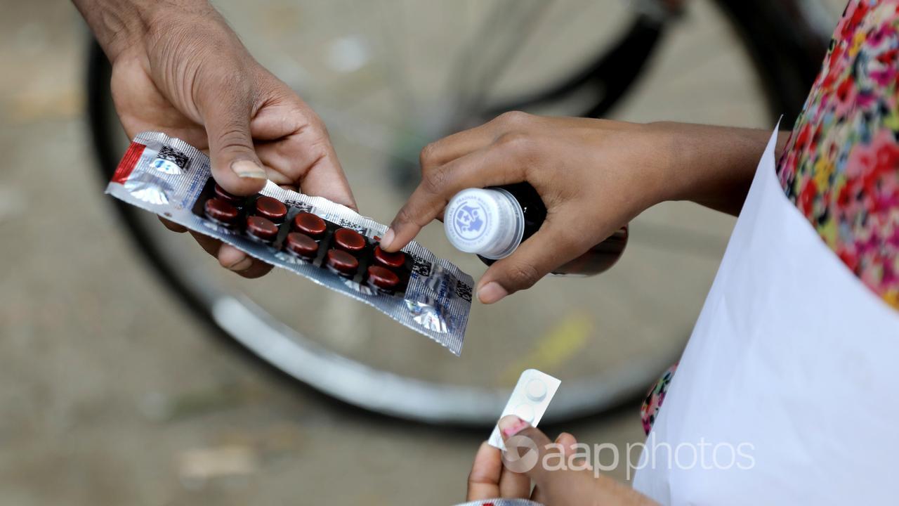 A patient receiving medicine.