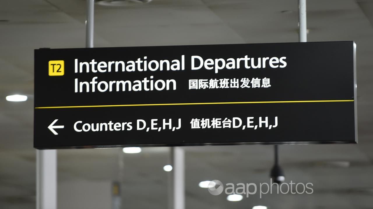 Signage for international departures at airport