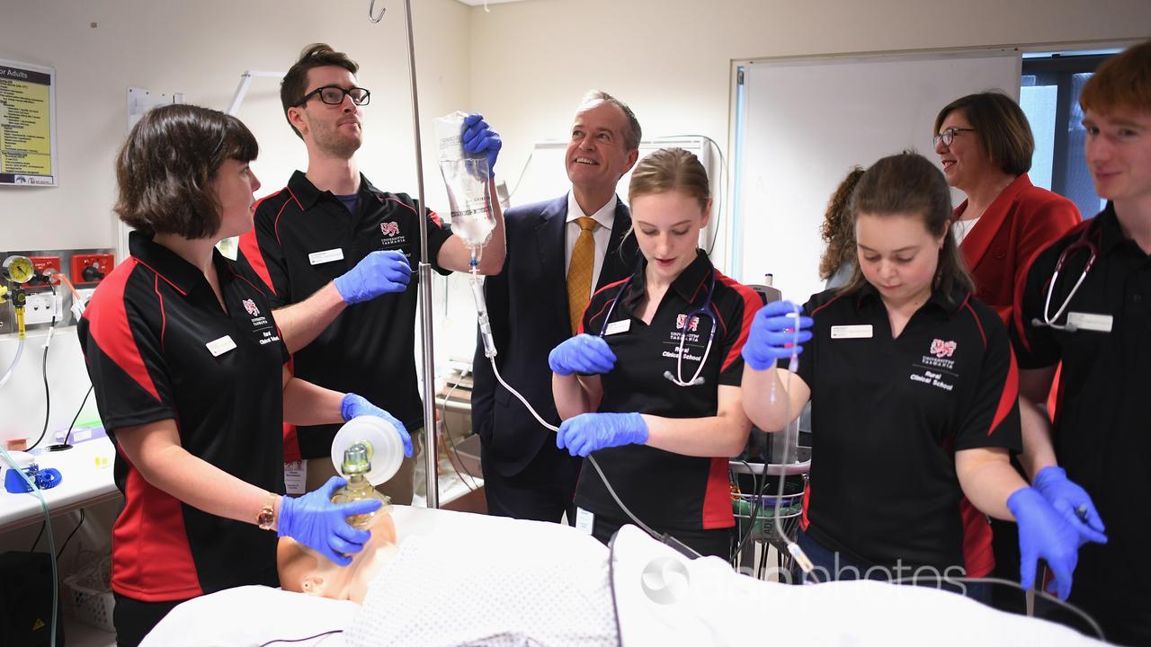 Medical students during a training procedure.