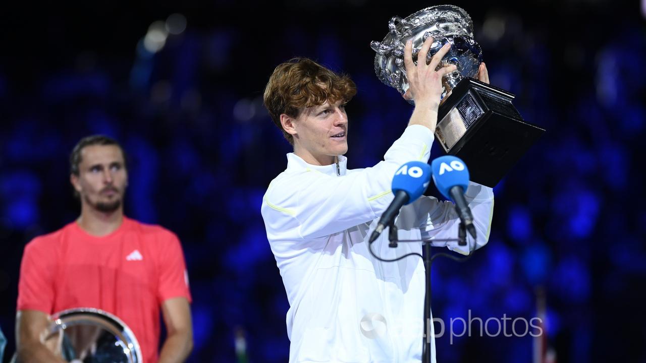 Alexander Zverev (left) looks on as Jannik Sinner.