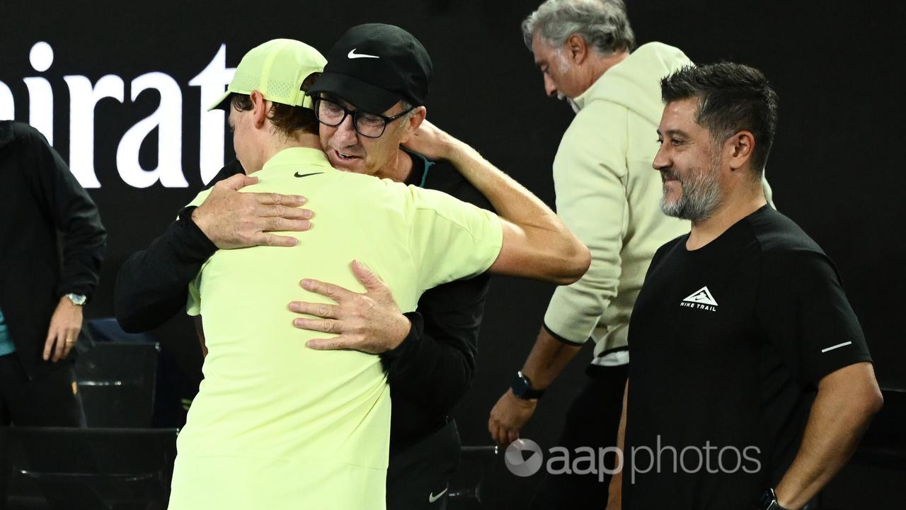 Jannik Sinner (left) hugs his Australian coach Darren Cahill.